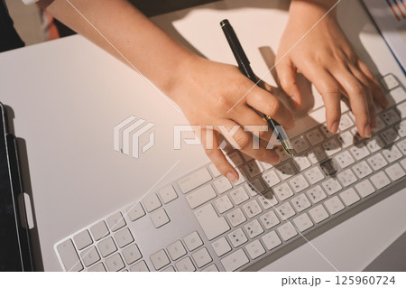Expert woman asian female people review data number costing managerial account prepare monthly actual cost variance report at tax audit office. ESG sheet budget control ERP process service project. 125960724