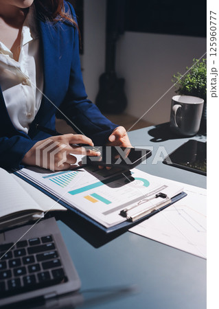 Expert woman asian female people review data number costing managerial account prepare monthly actual cost variance report at tax audit office. ESG sheet budget control ERP process service project. Expert woman asian female people review data number costing managerial account prepare monthly actual cost variance report at tax audit office. ESG sheet budget control ERP process service project. 125960777