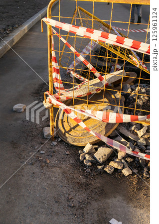 structure is metal with a red and white ribbon, dangerous territory.  125961124