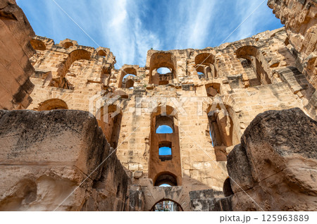 View to the rows of archs of the ancient african Roman Colosseum amphitheatre, El Jem, Mahdia, Tunisia 125963889