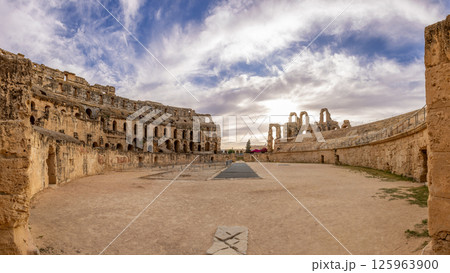 Entrance to ancient african Roman Colosseum amphitheatre arena panorama with ruins and columns, El Jem, Mahdia, Tunis 125963900