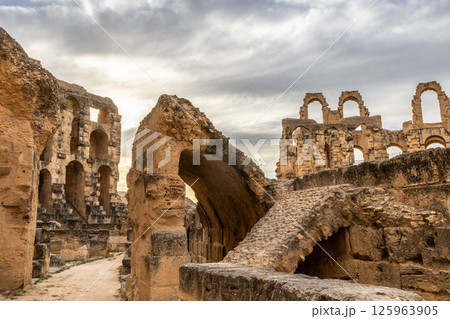 Ancient african Roman Colosseum amphitheatre ruins and columns, El Jem, Mahdia, Tunis Ancient african Roman Colosseum amphitheatre ruins and columns, El Jem, Mahdia, Tunis 125963905