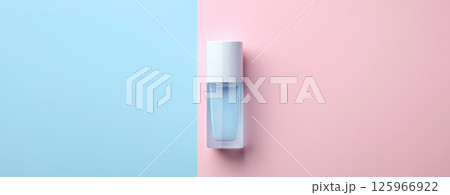 Clear cosmetic bottle with white cap on pastel pink and blue background, clean product shot with soft lighting and symmetry Clear cosmetic bottle with white cap on pastel pink and blue background, clean product shot with soft lighting and symmetry 125966922