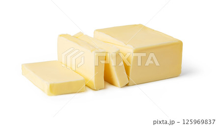 Butter block and slices resting on white background Butter block and slices resting on white background 125969837