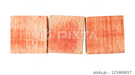 three blank red wooden blocks forming a horizontal line 125969857