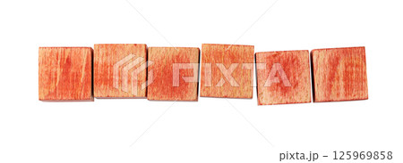 six blank red wooden blocks forming a horizontal line six blank red wooden blocks forming a horizontal line 125969858