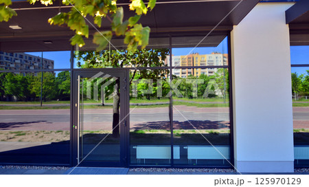 Panoramic windows of new commercial premises. Commercial property in development standard for rent. 125970129