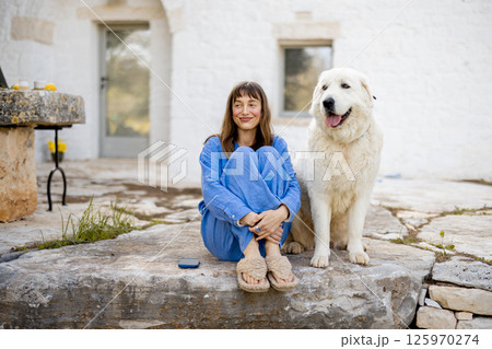 Peaceful moment with a loyal dog Peaceful moment with a loyal dog 125970274