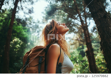 Soft, billowy clouds float against a clear, blue sky, their edges gently lit by sunlight, offering a calm, serene view of nature beauty Soft, billowy clouds float against a clear, blue sky, their edges gently lit by sunlight, offering a calm, serene view of nature beauty 125970662