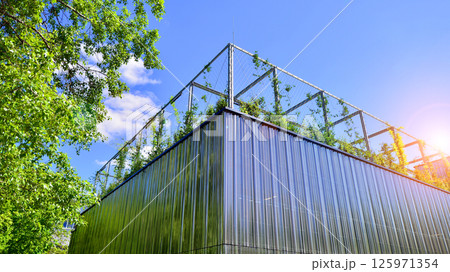 Architecture details of modern metal sheet facade storage building minimal style. Architecture details of modern metal sheet facade storage building minimal style. 125971354