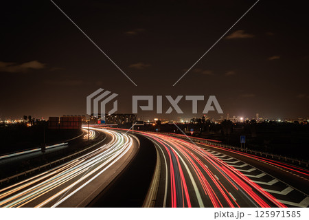 Long exposure photograph of car light trails Long exposure photograph of car light trails 125971585