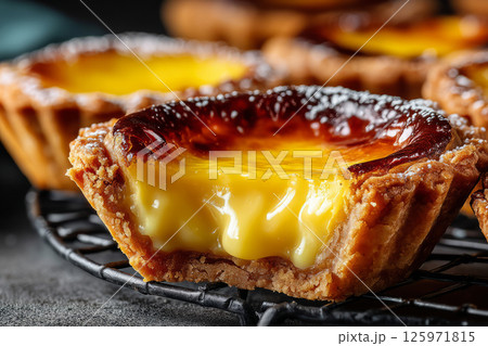 Chinese egg tart with caramelized top and creamy custard filling 125971815