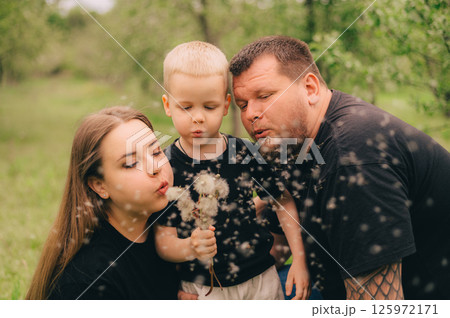 Family Portrait in Outdoor Setting with Smiling Faces 125972171