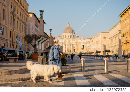 Woman Walking Dog Near Vatican Woman Walking Dog Near Vatican 125972582