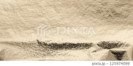 Gold and bronze crumpled foil texture with a reflective, metallic surface. Shimmering, vintage Gold and bronze crumpled foil texture with a reflective, metallic surface. Shimmering, vintage 125974099