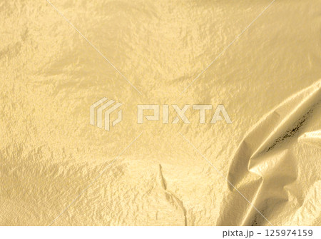 Golden foil background. Elegant, polished texture with subtle shimmer, soft and refined finish. Golden foil background. Elegant, polished texture with subtle shimmer, soft and refined finish. 125974159