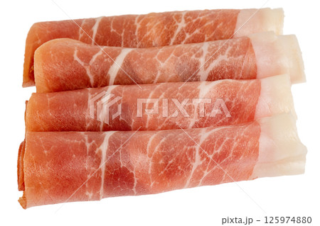 Jamon meat rolled up in a roll isolate on a white background. Jamon meat rolled up in a roll isolate on a white background. 125974880