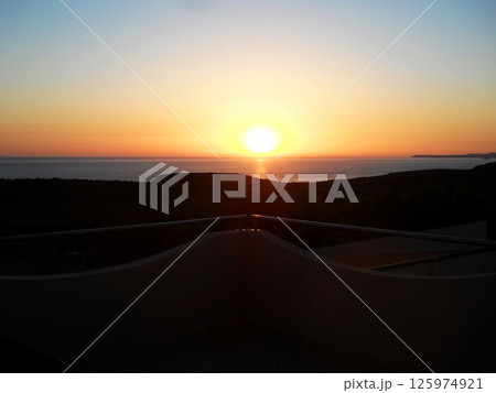 Beautiful sunset in the south of Sardinia. 125974921