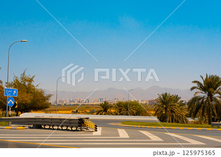 A picture of the city of Muttrah in the Sultanate of Oman, which features two historic castles from ancient times 125975365