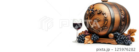 Rustic antique oak wine barrel with grapes and glass presented on a white background. Header banner mockup with copy space. 125976282