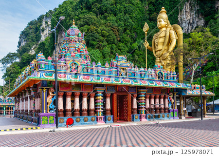 Colorful Sri Subramaniar Swamy Temple and Golden Lord Murugan Statue at Batu Caves, Kuala Lumpur, Malaysia 125978071