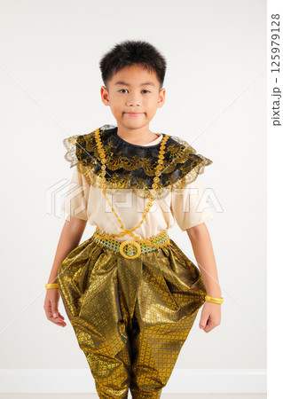Portrait of Thailand kid boy smiling traditional Thai dress costume in studio shot isolated white background, Happy Portrait primary little Portrait of Thailand kid boy smiling traditional Thai dress costume in studio shot isolated white background, Happy Portrait primary little 125979128