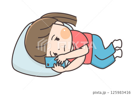 横になってぼんやりスマホを見る子供 125983416