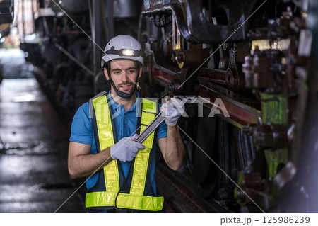 Engineer checking construction process railway and checking work on railroad station Engineer checking construction process railway and checking work on railroad station 125986239