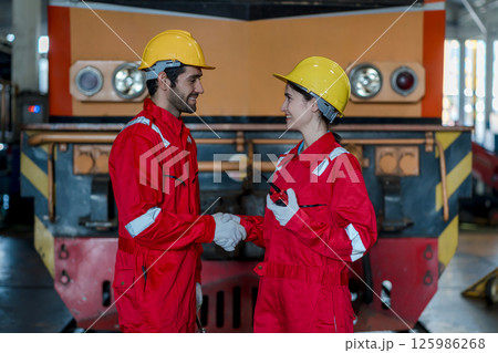 Engineer checking construction process railway and checking work on railroad station 125986268