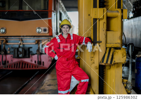 Engineer checking construction process railway and checking work on railroad station 125986302
