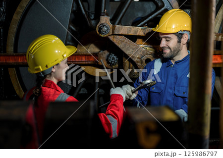 Engineer checking construction process railway and checking work on railroad station 125986797
