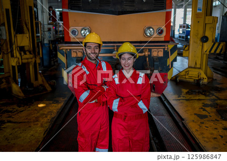 Engineer checking construction process railway and checking work on railroad station 125986847