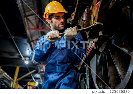 Engineer checking construction process railway and checking work on railroad station Engineer checking construction process railway and checking work on railroad station 125986889