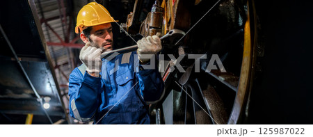 Engineer checking construction process railway and checking work on railroad station  125987022
