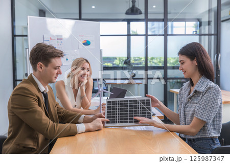 Business person meeting on solar cell panel technology. Business person meeting on solar cell panel technology. 125987347