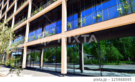 Panoramic windows of new commercial premises. Commercial property in development standard for rent. 125988095
