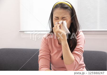 Sick Woman with Thermometer.Flu.Woman Caught Cold. Sneezing into Tissue. Headache.Virus. 125988247