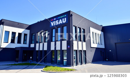 Warsaw, Poland. 1 May 2025. Logo and building Visau Multimedia. Technical event support. Company that provides event services. 125988303