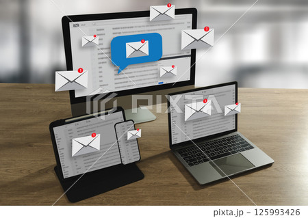 man reading e-mail on smartphone email inbox and email with laptop on internet information from spam mail man reading e-mail on smartphone email inbox and email with laptop on internet information from spam mail 125993426
