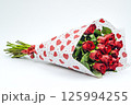 Elegant bouquet of red roses wrapped in craft paper with red hearts on white background. Valentines Day banner, weddings, anniversaries, or floral gift ideas. Marketing, blog articles, 125994255