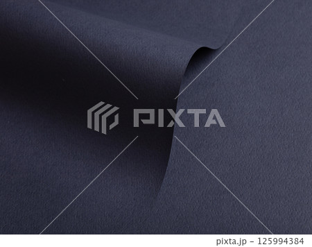 Paper texture with dark blue tone, clean matte surface and wavy folded composition, geometric line Paper texture with dark blue tone, clean matte surface and wavy folded composition, geometric line 125994384