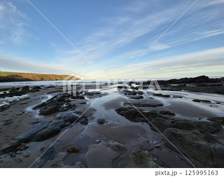 Dusk Over a Freezing Lake in a Natural Landscape 125995163