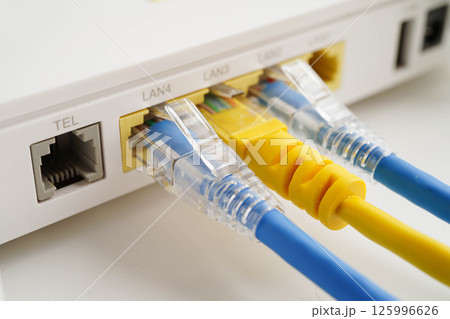 Ethernet cable with wireless router connect to internet service provider network. 125996626