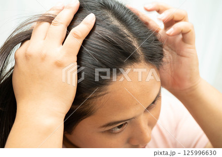 Woman with beautiful shine hair care treatment. 125996630