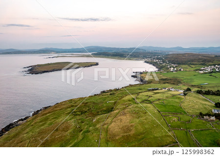 Aerial view of Dunmore Head by Portnoo in County Donegal, Ireland. 125998362
