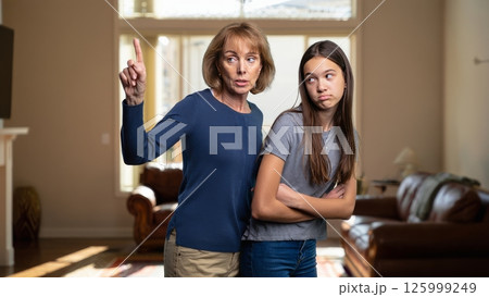 Mom Yelling While Teen Rolls Eyes, High Conflict Parenting Mom Yelling While Teen Rolls Eyes, High Conflict Parenting 125999249