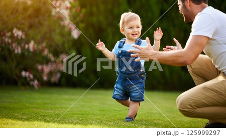 Baby First Steps Toward Smiling Parent in Backyard Baby First Steps Toward Smiling Parent in Backyard 125999297