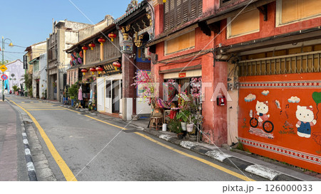 Colorful street with Chinese lanterns and Hello Kitty mural on Armenian Street in George Town Penang Malaysia vibrant heritage and cultural atmosphere 126000033