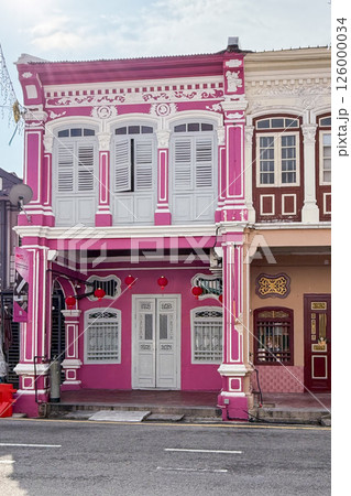 Morning light illuminates colorful heritage shophouses in George Town, Penang, Malaysia Morning light illuminates colorful heritage shophouses in George Town, Penang, Malaysia 126000034