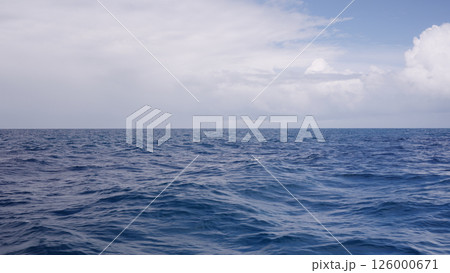 Side view from boat in Indian ocean sailing between Seychelles islands in daytime Side view from boat in Indian ocean sailing between Seychelles islands in daytime 126000671